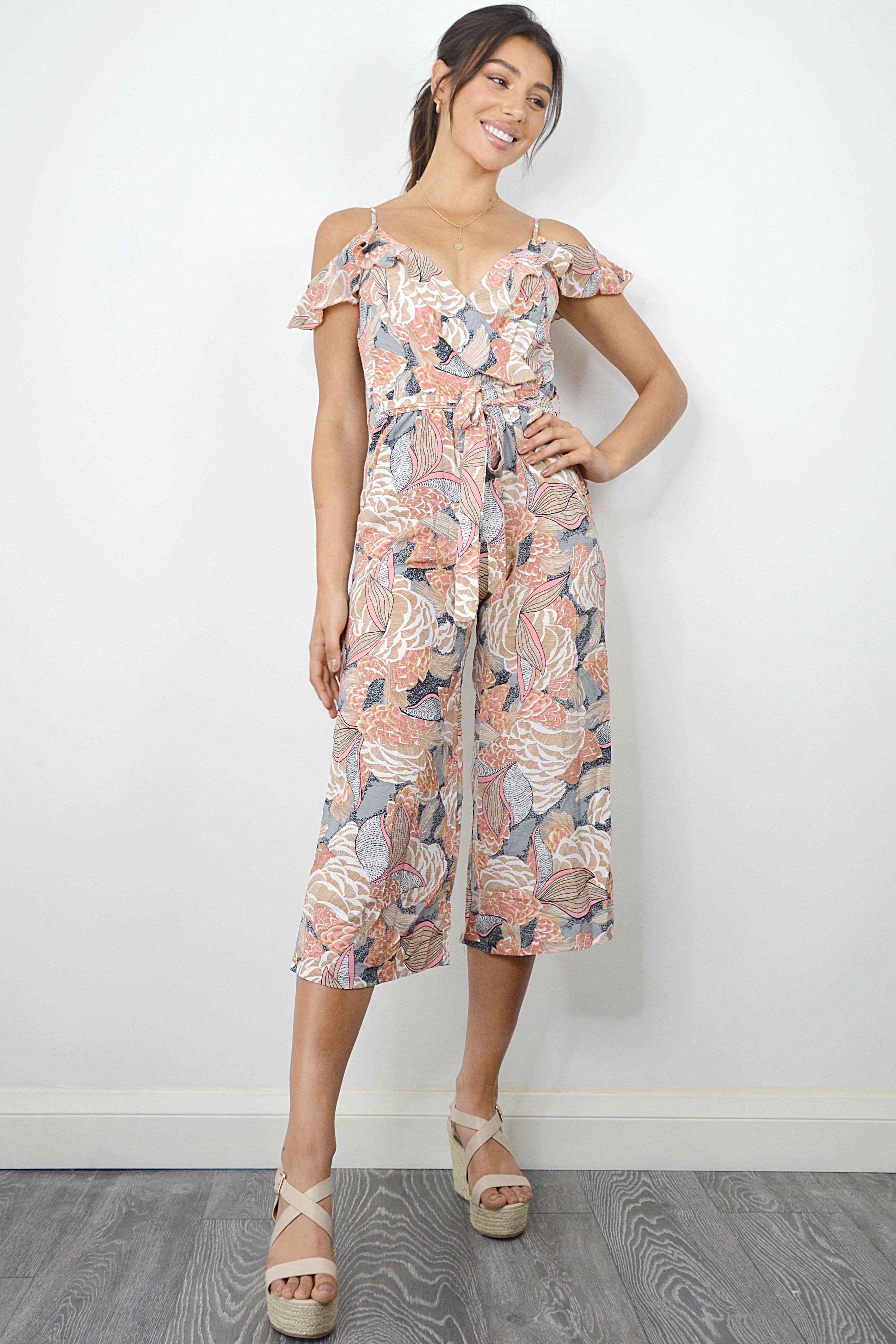 - Culotte jumpsuit  - Floral print  - Cold shoulder  - Length 122 cm  - Model Height: 5ft 9/175cm  - Model wears UK 8/EUR 36/US 4