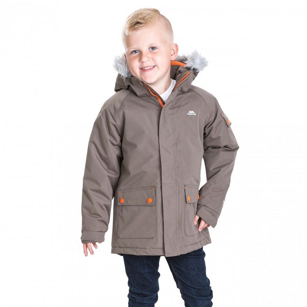 Lightly padded. Detachable stud off hood. Detachable fur trim. 2 lower patch pockets. Elasticated cuffs with adjustable tabs. Hem drawcord. Waterproof 5000mm, windproof, taped seams. Shell: 100% Polyester PVC, Lining: 100% Polyester, Padding: 100% Polyester. Trespass Childrens Chest Sizing (approx): 2/3 Years - 21in/53cm, 3/4 Years - 22in/56cm, 5/6 Years - 24in/61cm, 7/8 Years - 26in/66cm, 9/10 Years - 28in/71cm, 11/12 Years - 31in/79cm.