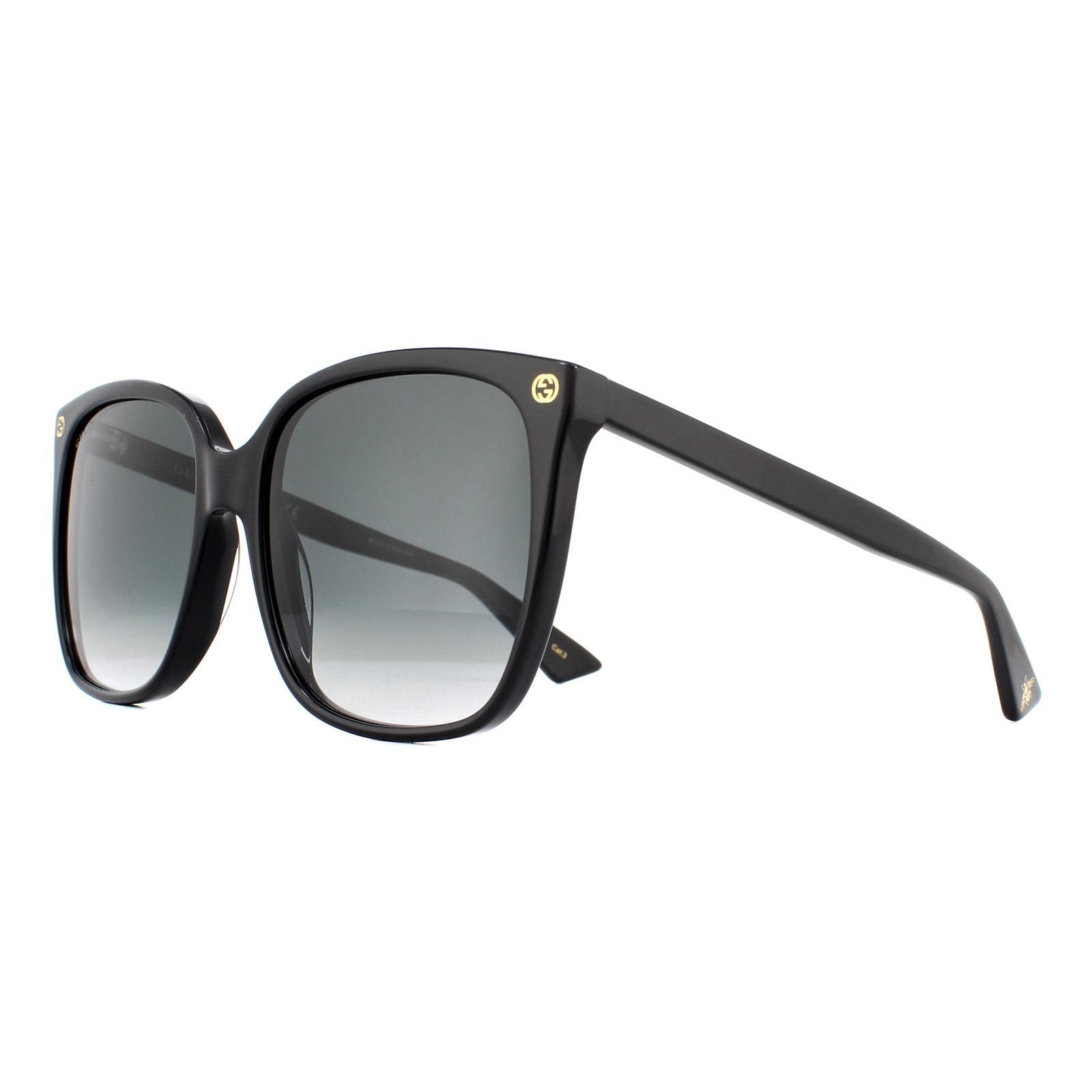 Gucci Sunglasses GG0022S 001 Black Grey Gradient have a simple squared off shape with the stylish GG logos at the front temples and a bee detail on the temple tip.