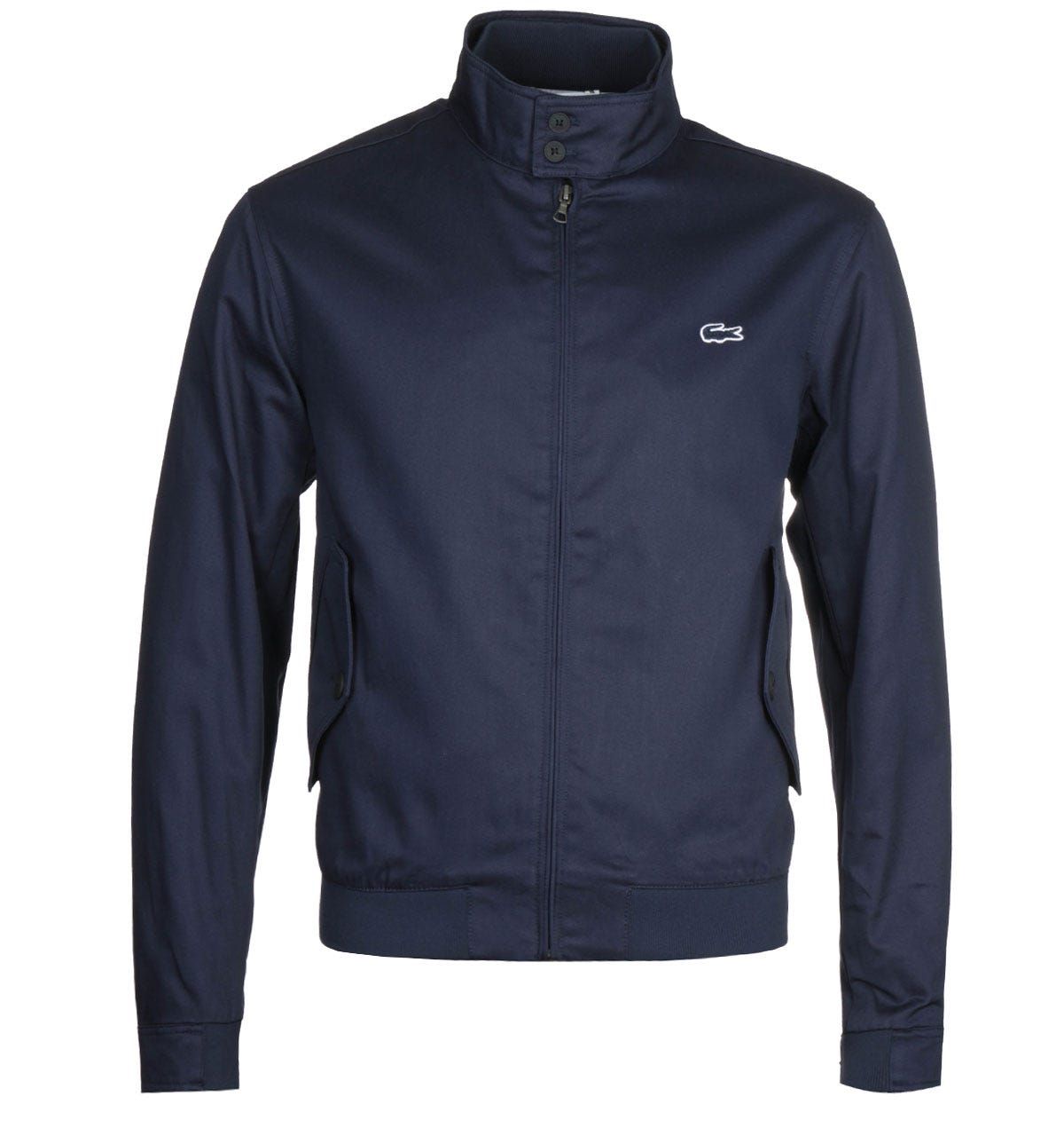 <p>A classic silhouette crafted by Lacoste. The Lacoste Lightweight Navy Zip Jacket is fitted with a full zip fastening, alongside a button collar for extra support in comfort. The jacket offers a layer of comfort and protection against all elements. The design is finished with the Lacoste logo embroidered on the chest.</p><ul><li>Cotton composition</li><li>Button collar</li><li>Zip fastening</li><li>Lacoste logo embroidered on chest</li></ul><p>Style & Fit:</p><ul><li>Regular fit</li><li>Fits true to size</li></ul><p>Fabric Composition & Care:</p><ul><li>100% Cotton</li><li>Machine wash</li></ul>