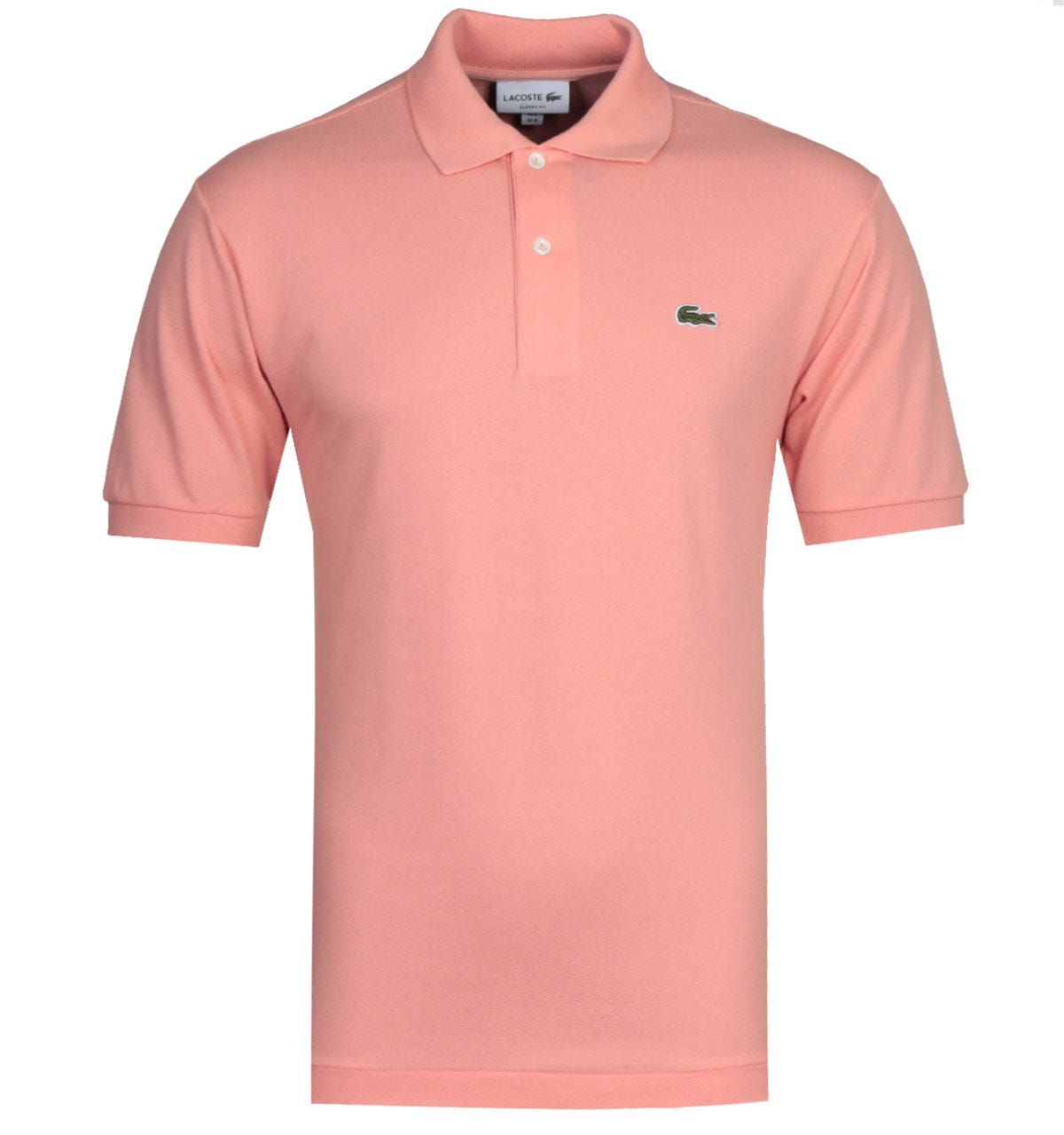 <p>A pure cotton composition, crafted by Lacoste. The Lacoste L1212 MC Homme Pink Polo Shirt is a lightweight garment, fitted with a two-button placket and ribbed trims. This iconic design is finished with the Lacoste logo embroidered at the chest.</p><ul><li>Cotton composition</li><li>Spread collar</li><li>Two button placket</li><li>Ribbed trims</li><li>Lacoste logo embroidered on chest</li></ul><p>Style & Fit:</p><ul><li>Regular fit</li><li>Fits true to size</li></ul><p>Fabric Composition & Care:</p><ul><li>100% Cotton</li><li>Machine washable</li></ul>