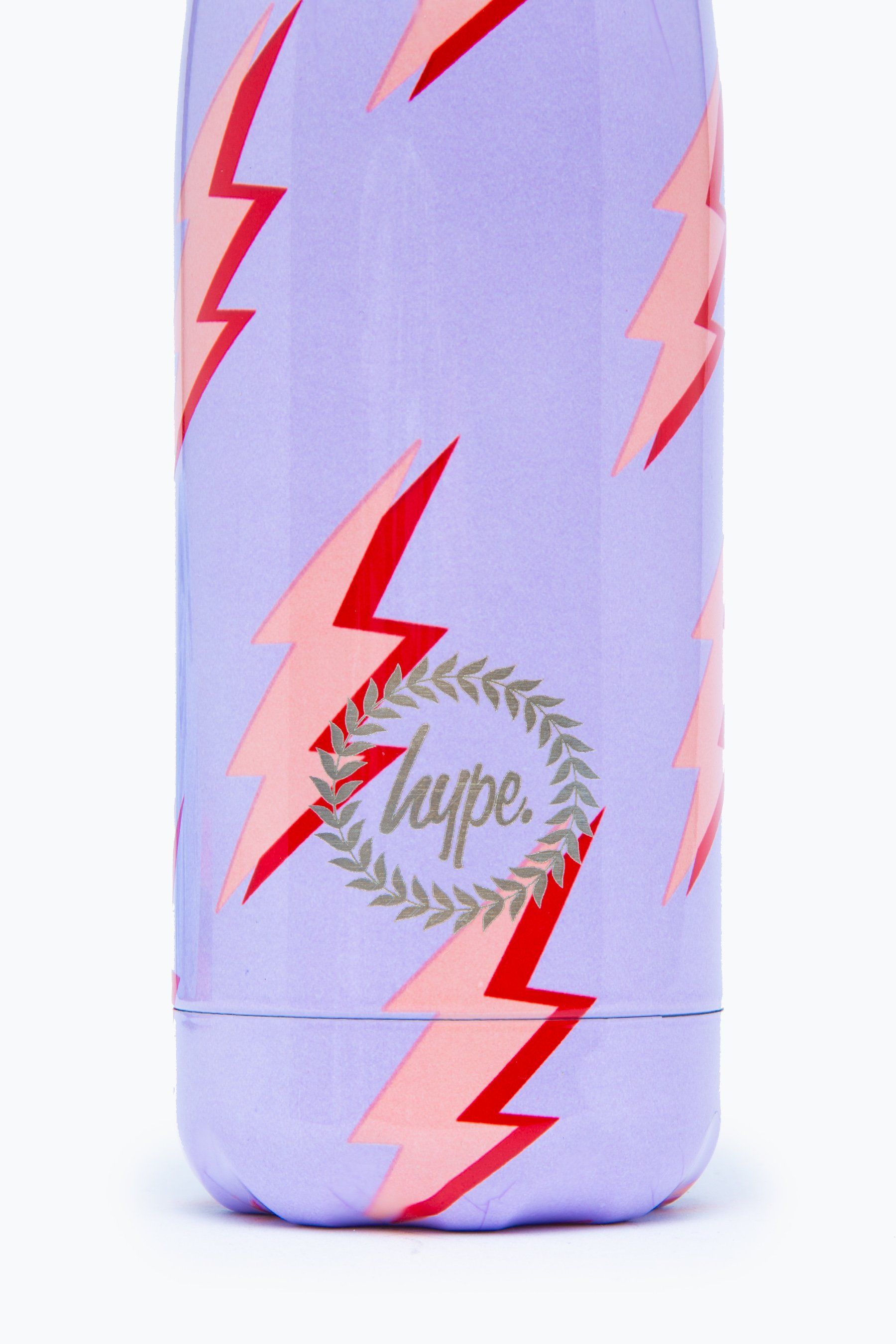 Keeping you hydrated, in style. Meet the HYPE. Lilac Lightning Metal Reusable Water Bottle, perfect for when you're on the go. The design features a paint-splat inspired effect in a pastel beige, blue and yellow. Designed in Aluminium to ensure your water stays ice-cold and for chillier days, keeping your oat milk latte warm for longer. Reuse it again and again with an airtight screw lid prevents spills. With an all-over lightning print in a pastel pink, peach and red colour palette. Why not grab one of our lunch bags or backpacks with a bottle holder to complete the look. Hand wash only.