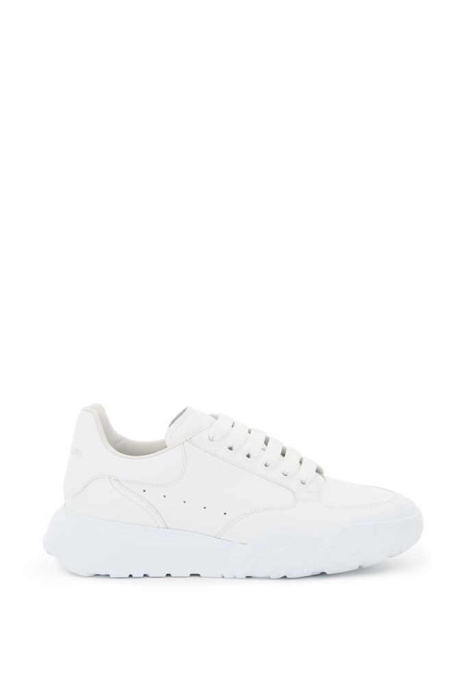 New Court leather sneakers by Alexander McQueen featuring an oversized rubber sole with an animalier motif in relief on the front and on the bottom. Painted metal eyelets, silver-tone logo print on the tongue and back, side perforations, leather interior with removable insole. Extra laces included.