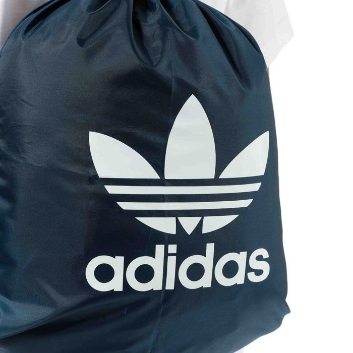 Mens adidas Originals Trefoil Gymsack  Navy. <BR><BR>- One main compartment with side zip pocket. <BR>- Drawcords attached at corners double as shoulder straps.<BR>- Screenprinted contrast Trefoil logo on front.<BR>- Dimensions: 37cm x 47cm.<BR>- 100% polyester plain weave. <BR>- Ref: BK6727.