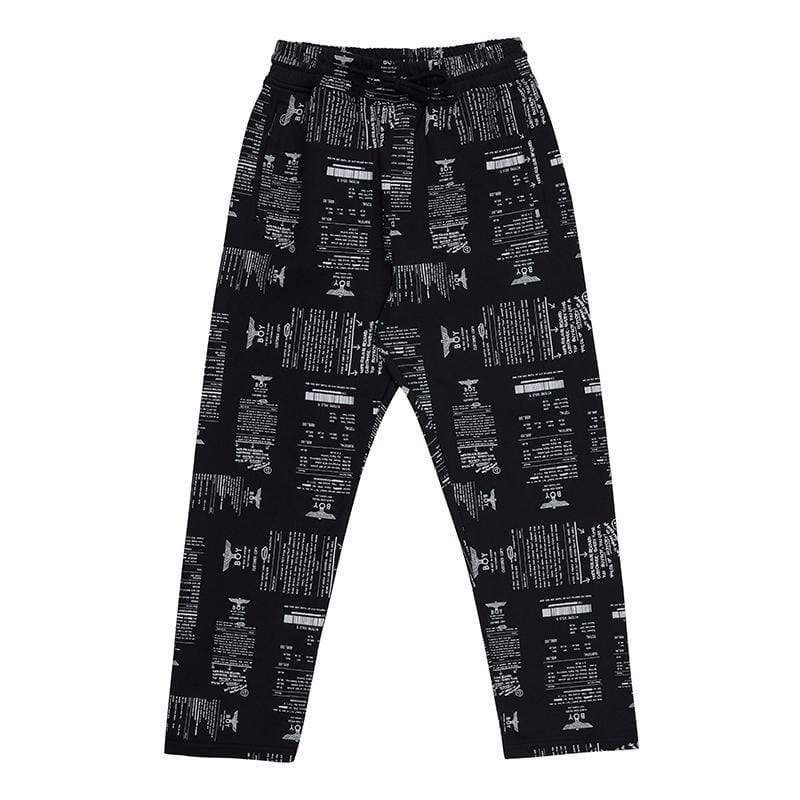 Regular fit joggers with a tapered leg, featuring receipt graphics printed all over garment. Black drawstring, elasticated waistband and cuffs in a 3 pocket design