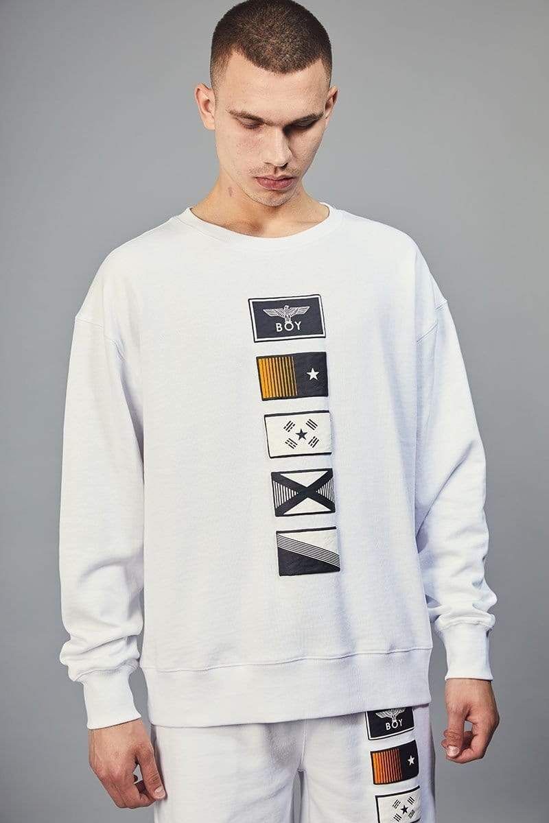 A round neck sweatshirt with five puff printed flag designs in the centre of the sweatshirt and BOY London printed along the back of the right shoulder.