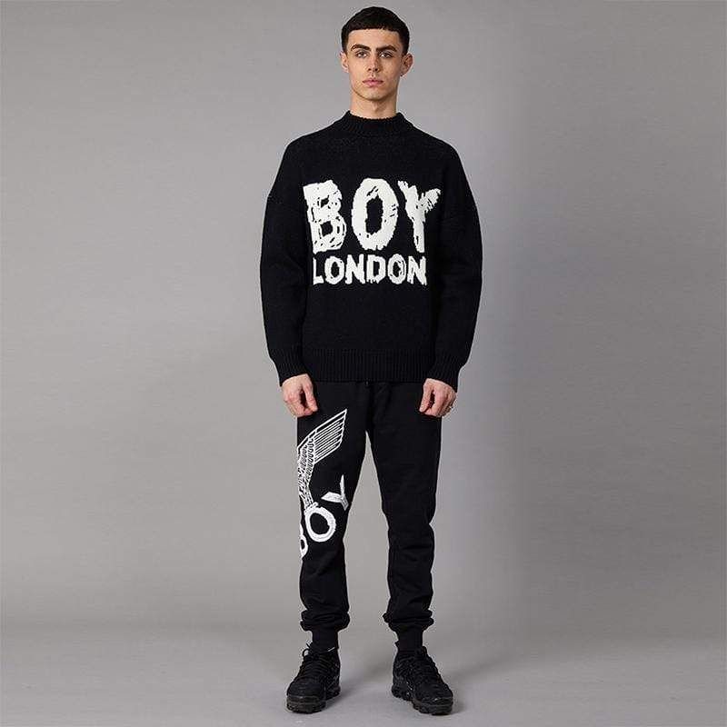 Long sleeve knitted, mock-neck jumper with a scribble variation of the BOY LONDON logo, knitted on front. Rib knit collar, cuffs and hems, drop-shoulder design, constructed from lightweight acrylic/wool fabric