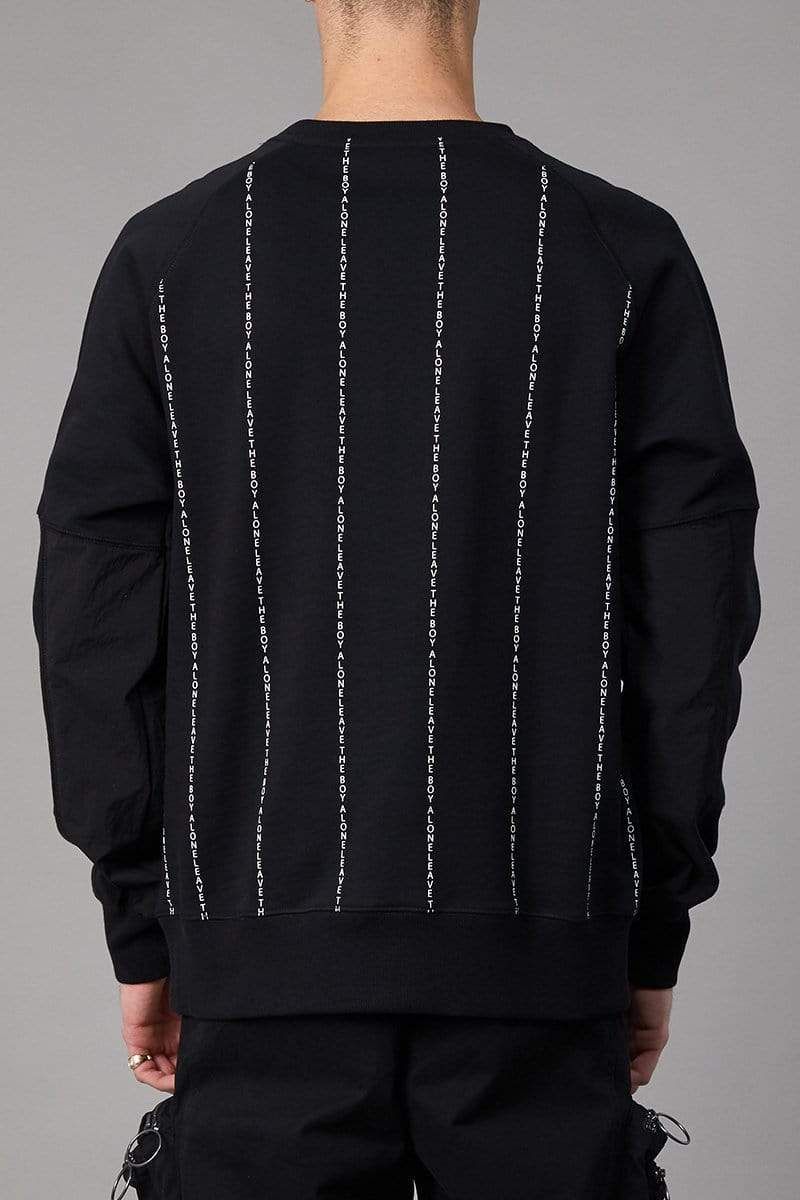 Crewneck, long-sleeve sweatshirt with metal BOY Eagle logo badge attached to front and 'leave the BOY alone' script printed on back. Covered chest pocket, 2 utility style zip pockets and ribbed cuffs and hems