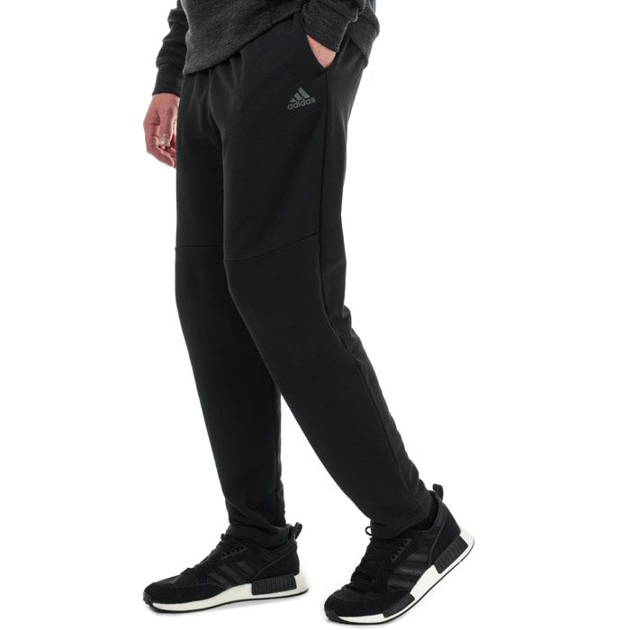 Mens adidas ID Tapered Pants in black.<BR><BR>- Elasticated waist with inner drawcord.<BR>- Front welt pockets.<BR>- Open hems.<BR>- Herringbone-pattern fabric.<BR>- adidas Badge of Sport logo printed at left hip.<BR>- Tapered leg.<BR>- Regular fit.<BR>- 76% Cotton  24% Recycled polyester.  Machine washable.<BR>- Ref: BP5453