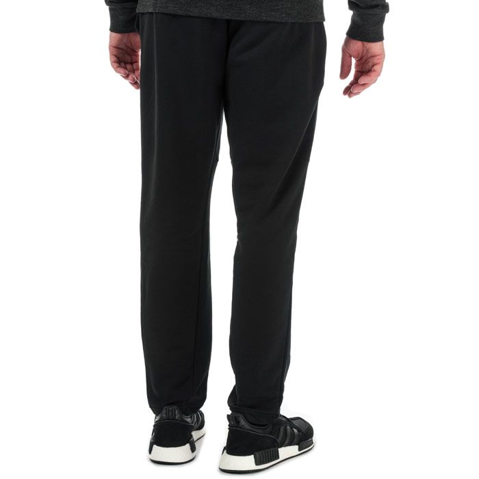 Mens adidas ID Tapered Pants in black.<BR><BR>- Elasticated waist with inner drawcord.<BR>- Front welt pockets.<BR>- Open hems.<BR>- Herringbone-pattern fabric.<BR>- adidas Badge of Sport logo printed at left hip.<BR>- Tapered leg.<BR>- Regular fit.<BR>- 76% Cotton  24% Recycled polyester.  Machine washable.<BR>- Ref: BP5453