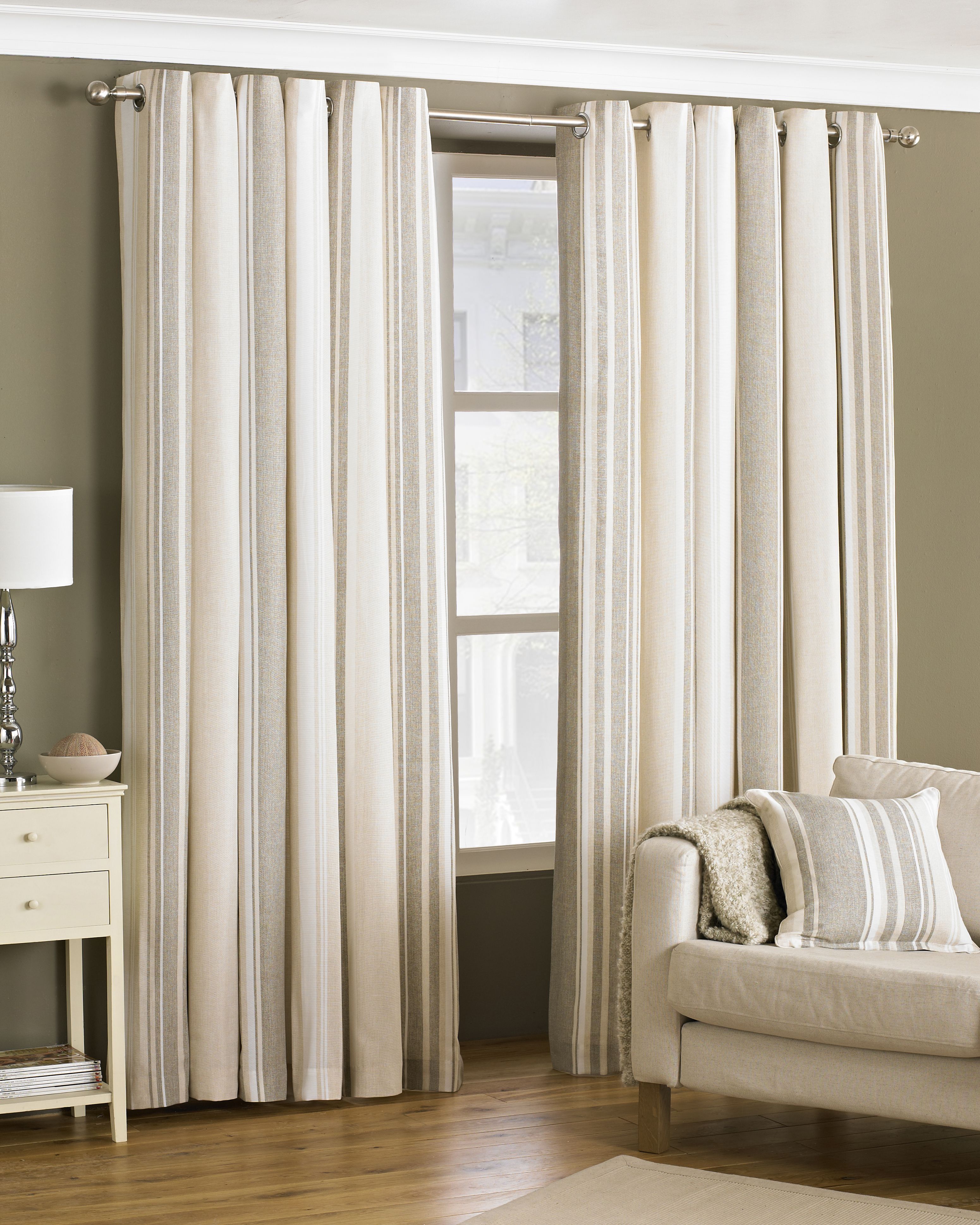 A wonderful and well co-ordinated stripe design allows the Broadway lined eyelet curtains to provide a touch of contemporary appeal to any room. Fully lined and crafted from cotton rich material, the Broadway curtains create a tastefully stylish atmosphere, along with an eyelet ring top heading for that extra modern touch. Made of polycotton these curtains are incredibly soft making them fall effortlessly while also able to withstand the everyday wear and tear of a hectic household. These curtains feature stainless steel eyeless holes for easy installation with no need for hooks or rings - you need only supply the curtain pole. As these curtains are a delicate addition to your home they will need extra care and are therefore dry clean only, however can still be ironed.