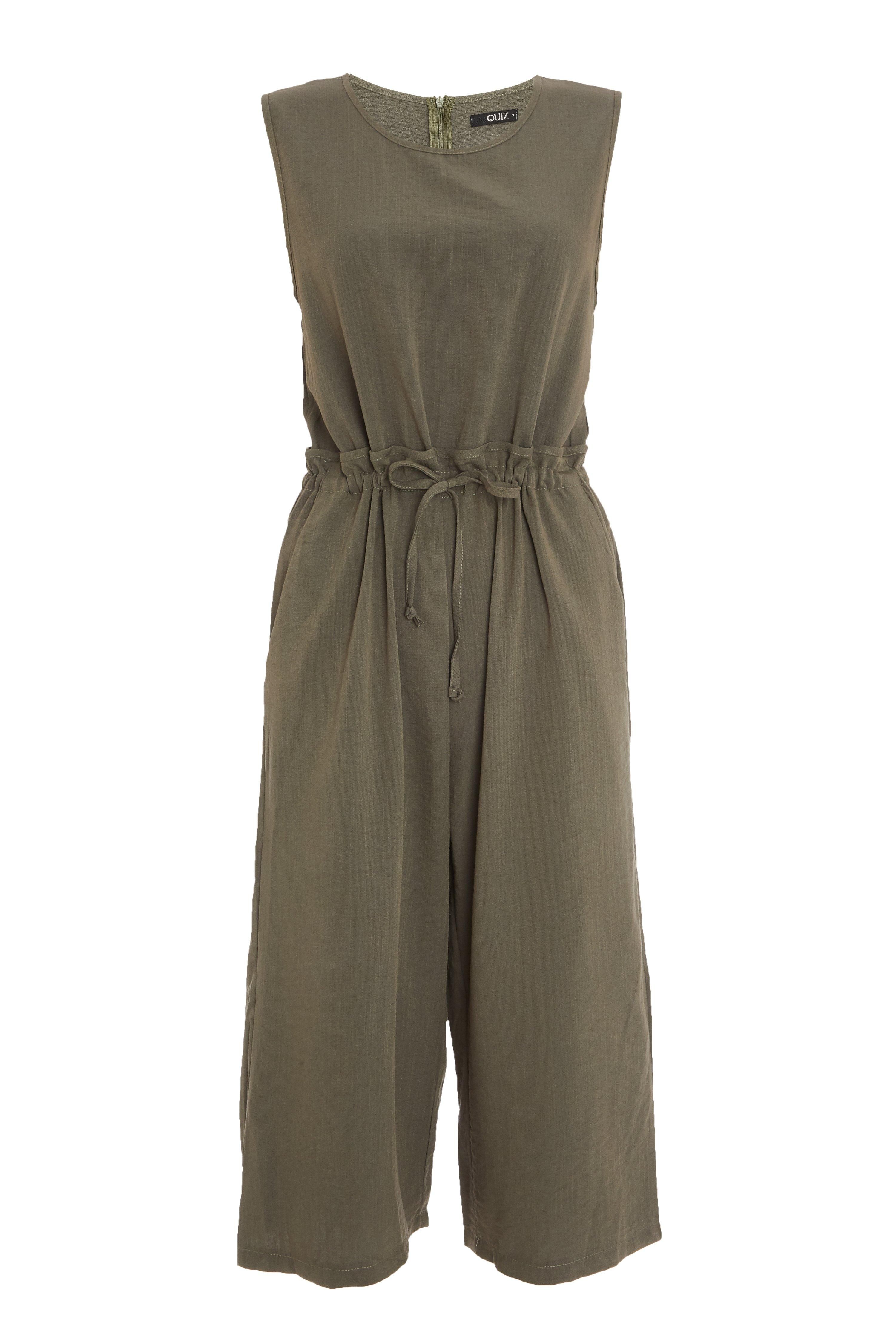 - Sleeveless   - Round neck   - Elasticated waist   - Culotte style   - Length: 113 cm approx  - Model Height: 5' 8