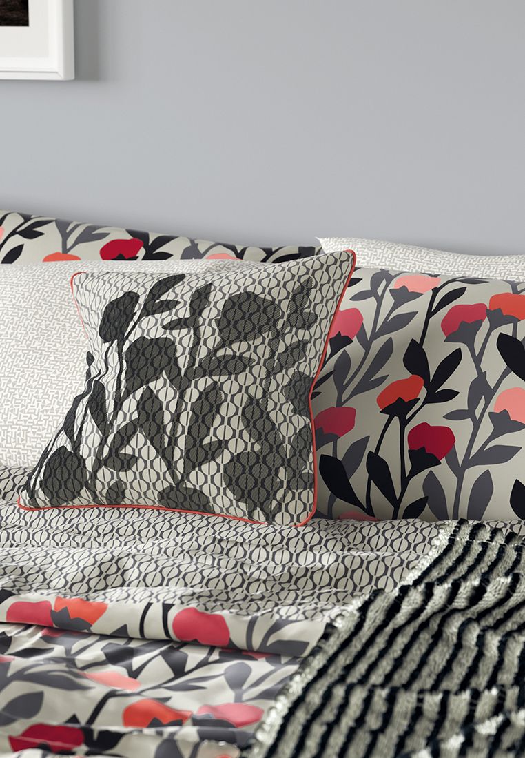 A floral design with a distinctive Scandi feel, ‘Ava’ presents an all over pattern of flowers in a palette of stone and charcoal with vivid coral pops. The reverse, made up of a modern circular geo pattern all over adds a contemporary edge.  Includes Pillowcase(s). Machine Washable. Made in Pakistan.