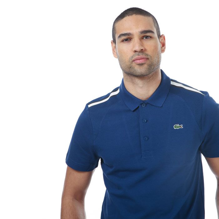 Mens Lacoste Panelled Ultra- Light Polo Shirt in blue.- Ribbed polo collar.- Short sleeves.- Three button placket.- Branded button fastening.- Ultra-light cotton knit.- Mesh panels on shoulders and back.- Embroidered green crocodile on chest.- 100% Cotton. Machine washable.- Ref: YH489000P14