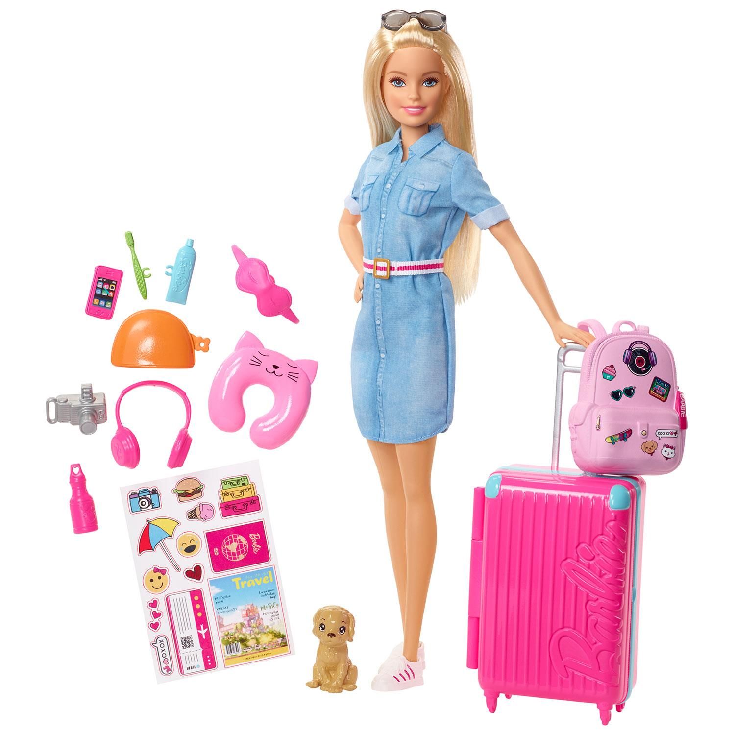 Inspired by Barbie's Dreamhouse Adventures, this set comes with so many accessories for hours of fun play. Peek into the everyday life of Barbie's exciting adventures. Includes a Barbie doll wearing fashion and shoes, a puppy and carrier, suitcase, backpack, sticker sheet and 10 travel-themed pieces. Dolls cannot stand alone. Colours and decorations may vary. Barbie can take her puppy and your young Barbie fan around the world with this travel-themed set. Complete with a puppy travelling companion and a pink suitcase that opens and closes - it even has a collapsing handle, just like real luggage.

Adorable kids toy from Barbie; send curious minds around the world with a Barbie doll and a travel-themed set inspired by Barbie Dreamhouse Adventures that comes with a puppy for a travel companion, luggage and more than 10 accessories.
​Barbie's pink suitcase has a collapsible handle and opens and closes for packing and unpacking fun - decorate it with the included sheet of stickers (like emojis and a pink passport).
​Iconic travel items included in the set are decorated with bright colours and fun stickers - there's a neck pillow, headphones, eye mask, water bottle, toothbrush, toothpaste, camera and a mobile phone.
​The doll comes ready for children to visit places near and far; wearing a range of Barbie accessories, including a denim shirt dress with colourful belt detail and matching trendy trainers, while a pair of sunglasses add the finishing touch.
Includes a Barbie doll wearing fashion and shoes, puppy and carrier, suitcase, backpack, sticker sheet and 10 travel-themed pieces; doll cannot stand alone; colours and decorations may vary.


Box Contains 1x Barbie Doll, 1x Puppy, 1x headphone, 1x neck pillow, 1x camera, 1x water bottle, 1x cell phone, 1x bag pack, 1x trolly bag, 1x eye mask, 1x toothbrush, 1x toothpaste.
