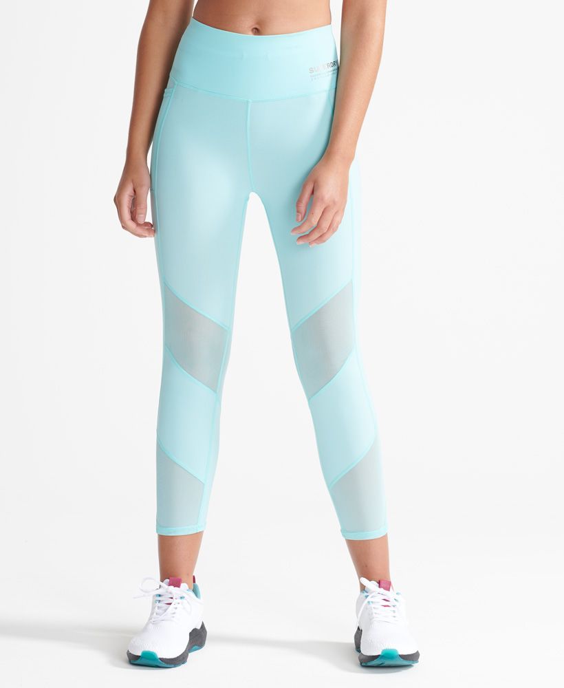 Superdry women's cooling Capri leggings. Stay cool in these Capri cooling leggings featuring mesh panelling to the legs to allow heat to escape, a zip back pocket, mesh phone sleeve and drawstring elasticated waist. finished with Superdry Sport branding to the waistband.Fitted: A body-sculpting fit, tight to the body