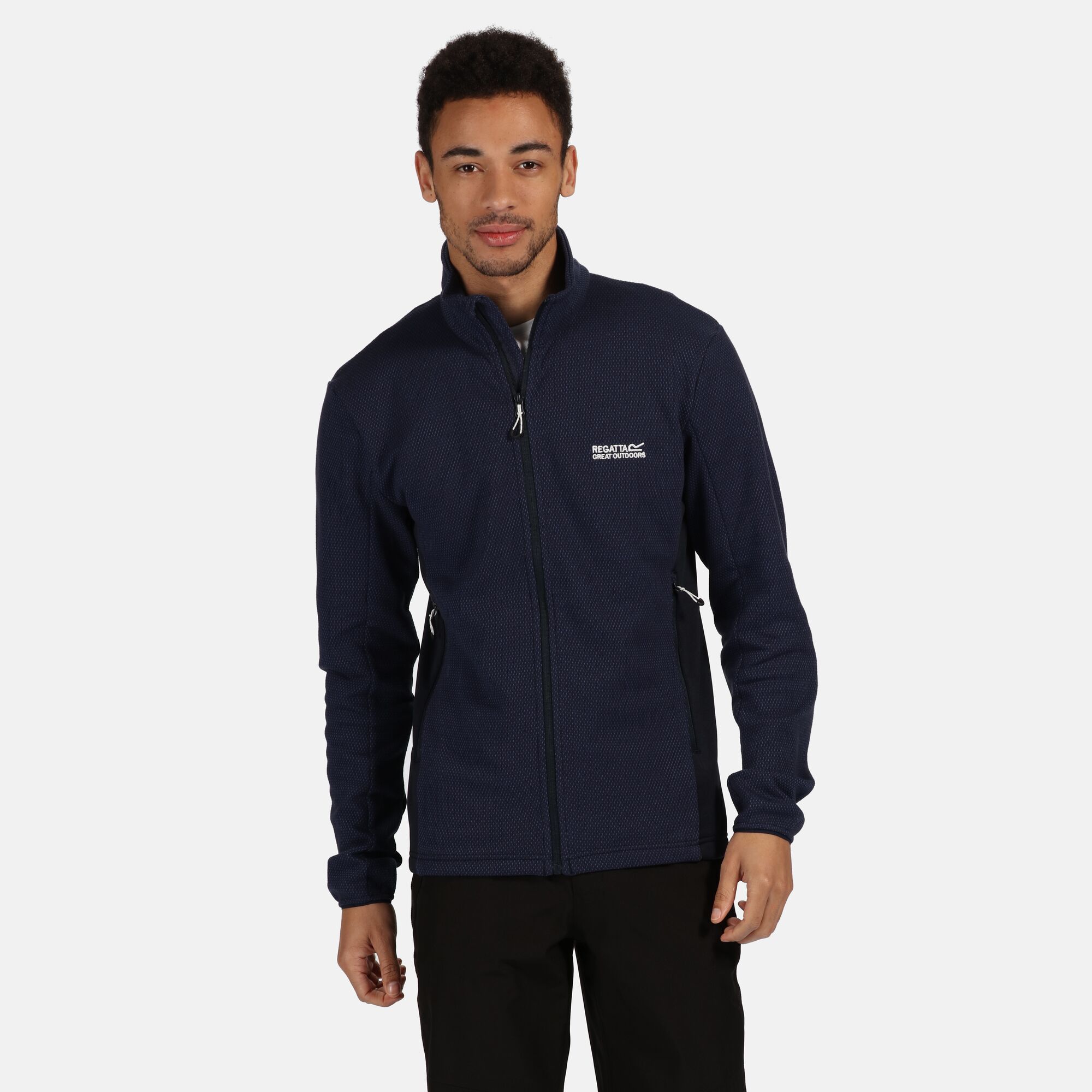 Material: 74% Cotton, 26% Polyester. Two-tone cotton blend fleece (230gsm) with Extol stretch side panels. Breeze blocking stand collar. Features 2 lower zipped pockets. Regatta logo embroidery on the chest.