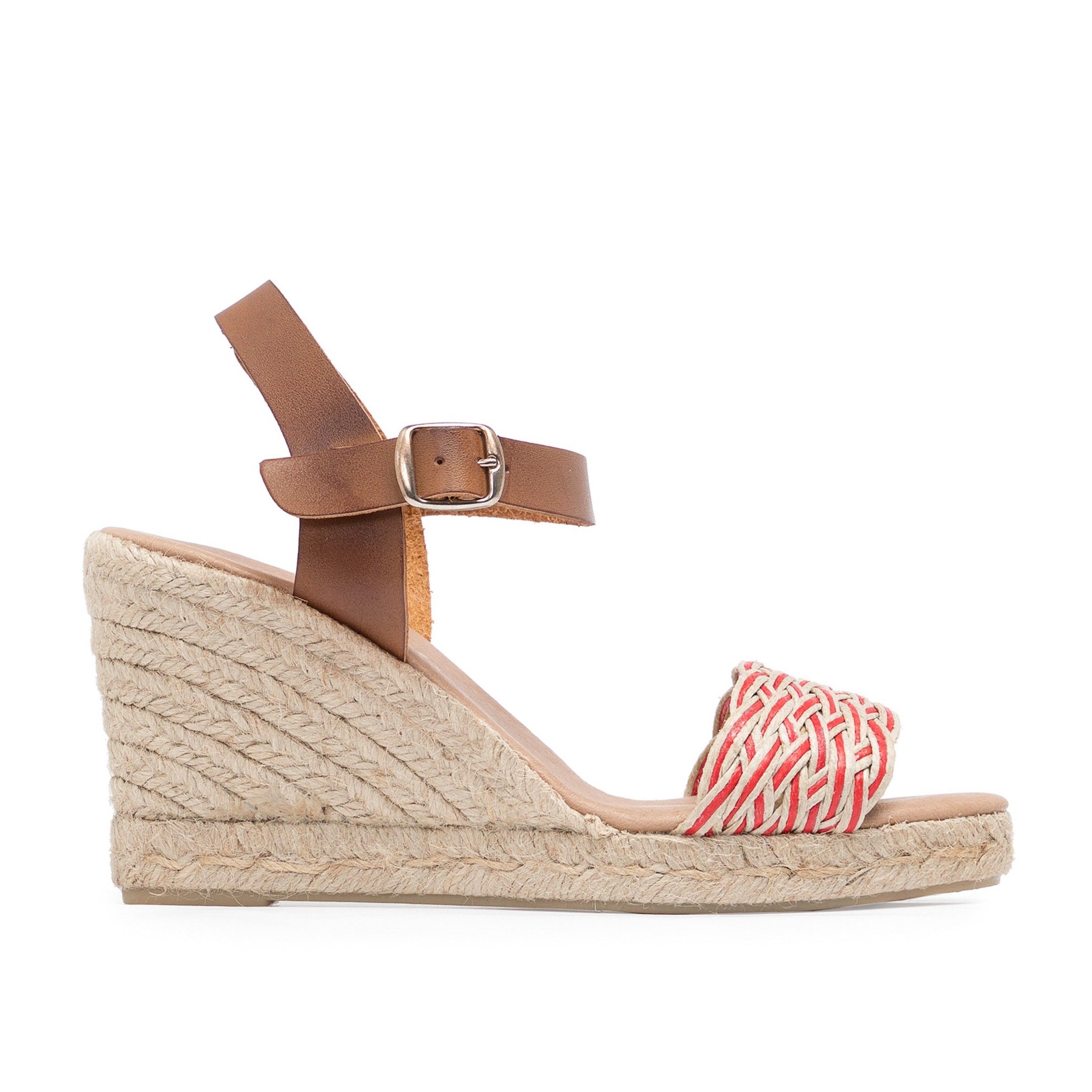 Ankle strap nappa leather sandals with seven strings. By Maria Barcelo. Upper made of cowhide leather and textile. Metal buckle closure. Inner lining and insole: pig lining. Padded sole of 0,3 cm. Sole material: synthetic. High heel: 9 cm. Platform: 2 cm. Designed and made in Spain.