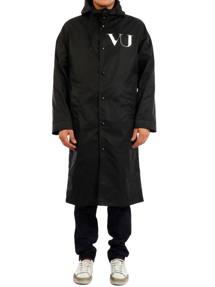 Raincoat designed in collaboration with Undercover and made of black nylon with 