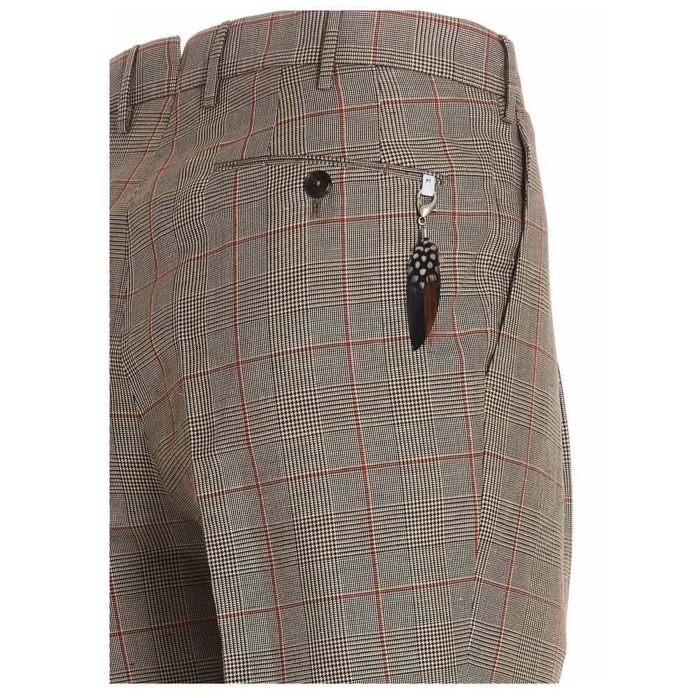 'Flicker' trousers in a check patterned fabric featuring turn ups.