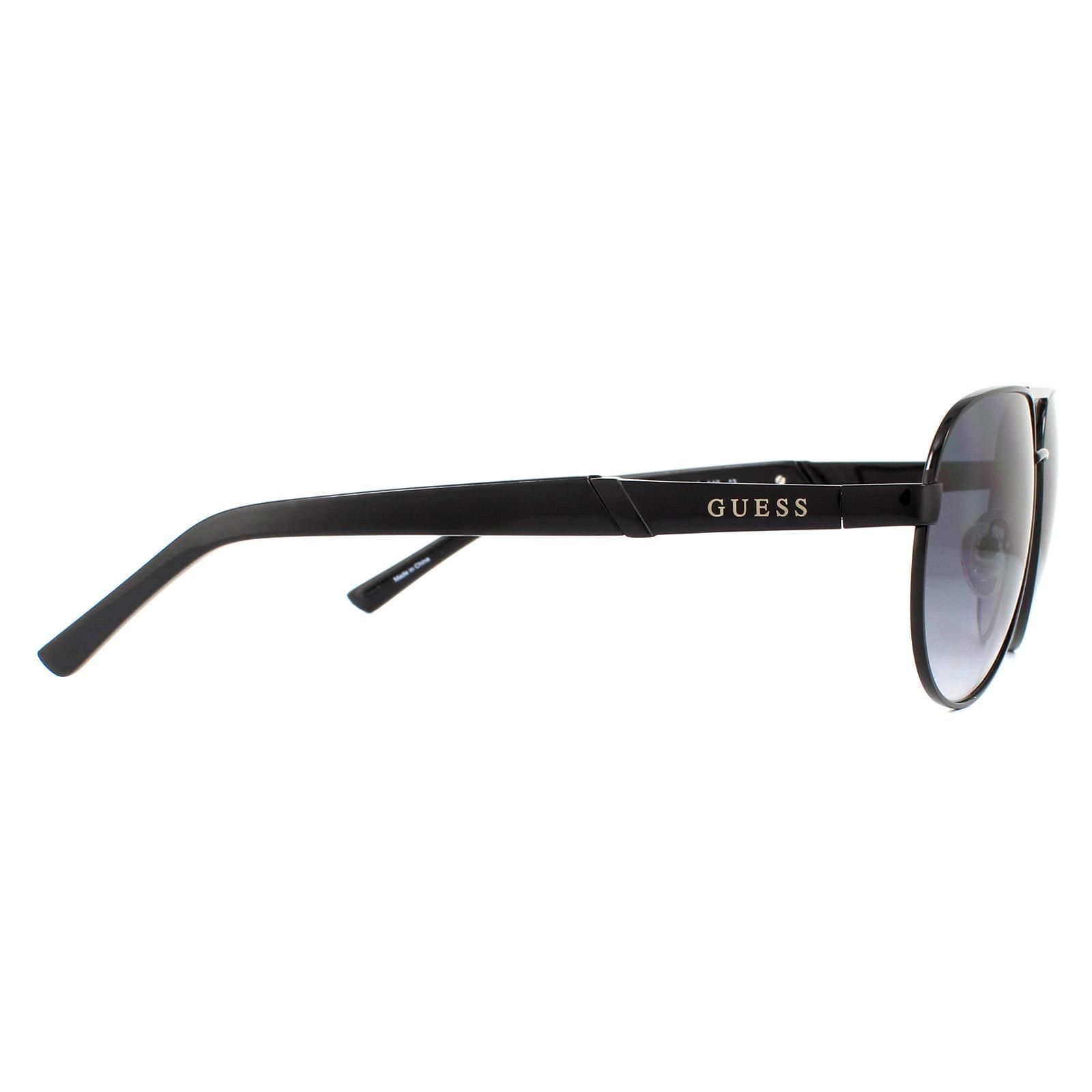 Guess Sunglasses GF5031 01B Black Grey Gradient are a stylish pilot style with a sold metal frame which then merges diagonally, halfway down the arms after the Guess logo, into plastic temple tips.