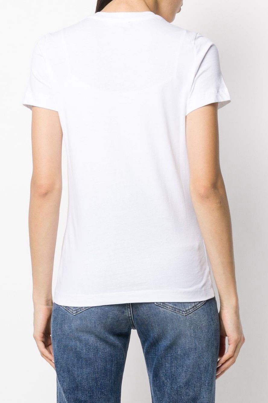 Brand: Diesel
Gender: Women
Type: T-shirts
Season: Spring/Summer

PRODUCT DETAIL
• Color: white
• Pattern: print
• Fastening: slip on
• Sleeves: short
• Neckline: round neck

COMPOSITION AND MATERIAL
• Composition: -100% cotton 
•  Washing: machine wash at 30°