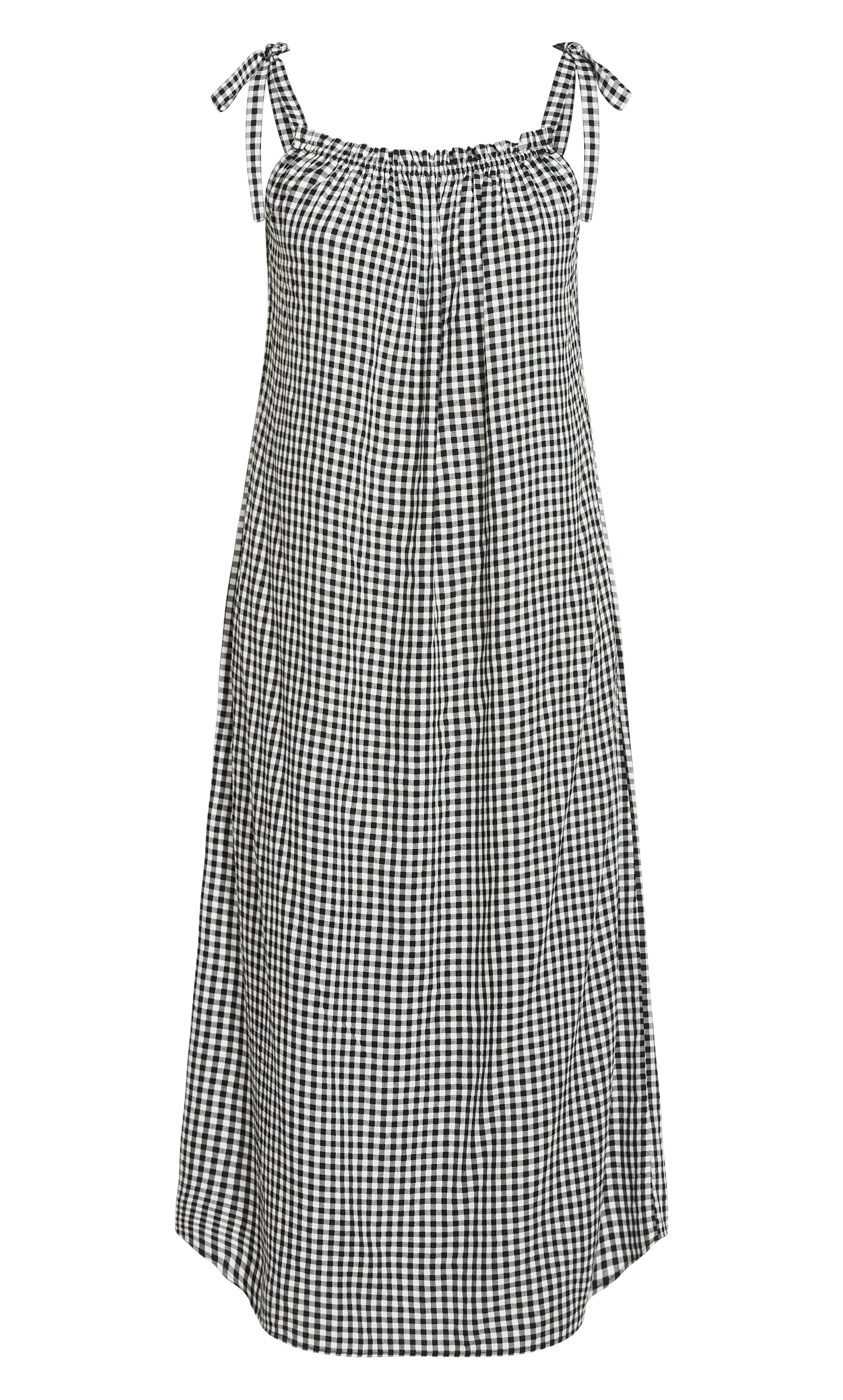 Go get 'em in gingham! Our curve-flattering Gingham Print Dress is a dreamy summer staple, flirting with sweet bow tie straps and a breezy relaxed fit. From sunny picnics in the park to rooftop cocktails, this maxi dress is a head-turner through and through! Key Features Include: - Elasticated curved neckline - Self-tie shoulder straps - Relaxed fit - Maxi length hemline - Pull over style Keep it casual in slides and a pair of cat-eye sunglasses or elevate your look with block heels and a cinching waist belt.