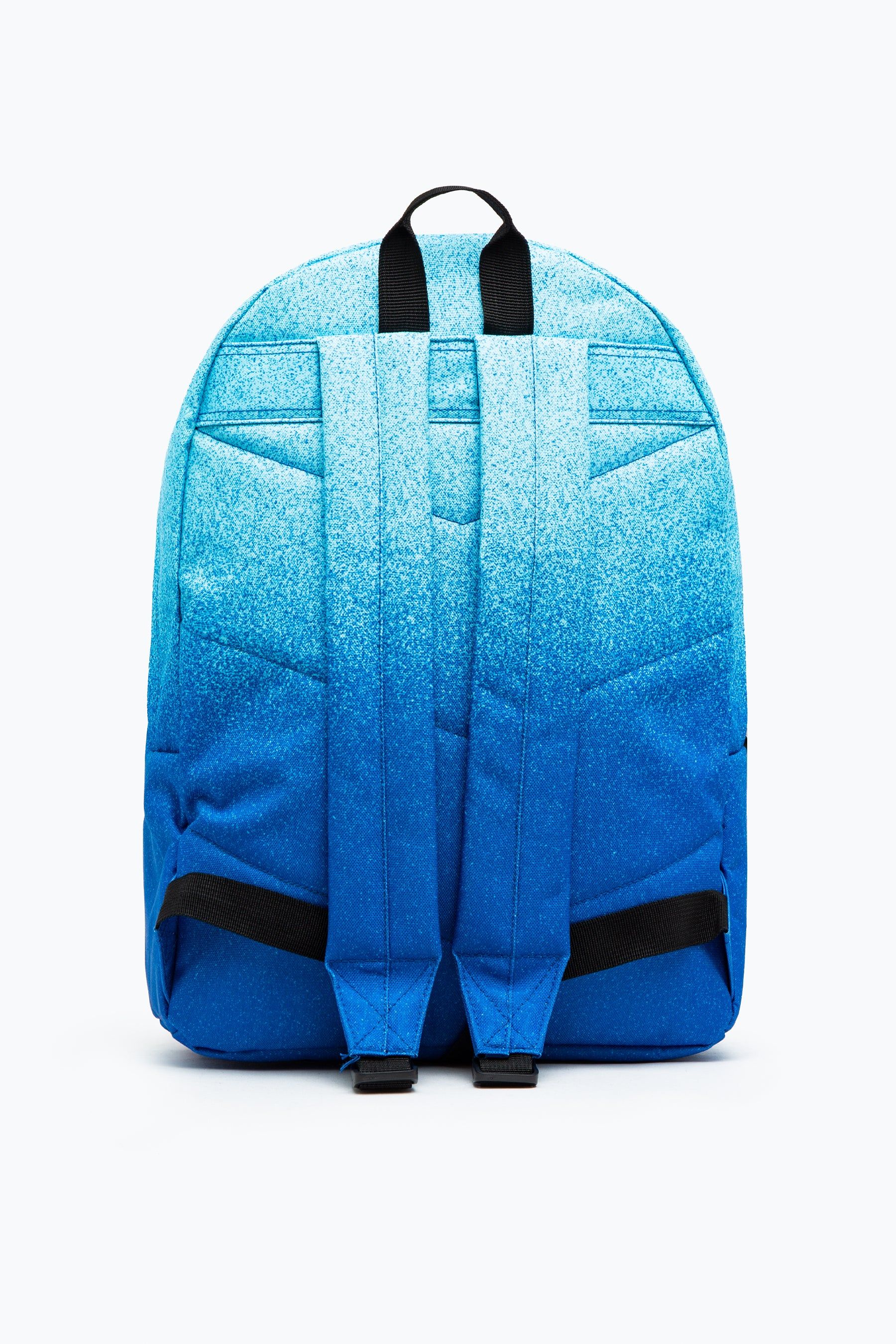 Let us introduce you to the HYPE. Blue Speckle Fade Backpack. Designed in our standard unisex backpack shape and design, measuring at 42cms x 30cms x 12cms, this is the perfect size to transport your matching pencil case, lunch bag and P.E kit. Finished with a front mini pocket, grab handle, embossed zips, branded inside lining and the iconic HYPE. crest badge in monochrome on the front. The straps offer supreme comfort with just the right amount of padding. Wipe clean only.