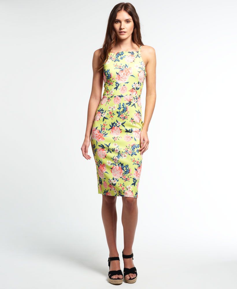Superdry women's Sultry Scuba Pencil dress. Making the perfect party dress, the Sultry Scuba features an all over floral design with a high neck line, straps and fitted pencil skirt to create a figure- skimming bodycon silhouette. The Sultry Scuba Pencil dress is finished with a small split on the back of the skirt.