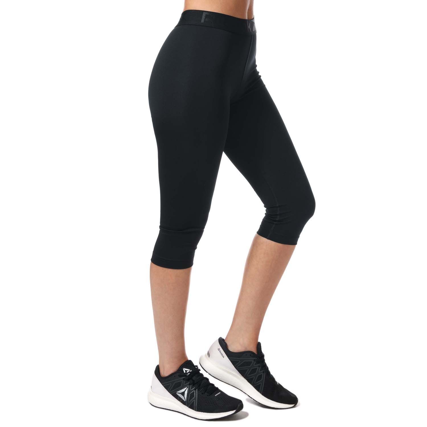 Womens Reebok Workout Ready Capri Tights in black.- Wide waistband and Reebok graphic.- Moisture-wicking fabric.- Reebok branding.- Fitted fit.- Main material: 91% Polyester  9% Elastane.  Machine washable. - Ref: FQ0405