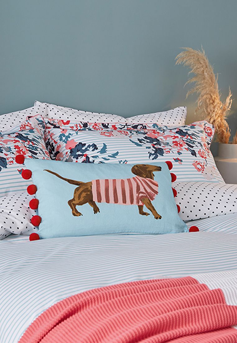 Add a breath of fresh air to your bedroom with this charmingly detailed duvet cover. In cotton percale for crisp, cool comfort, the design combines seaside inspired stripes with a burst of coastal wildflowers. With polka dots to the reverse and piped edging for textural interest. Matching oxford pillowcase included in sets. 180 Thread Count, Made in Pakistan.