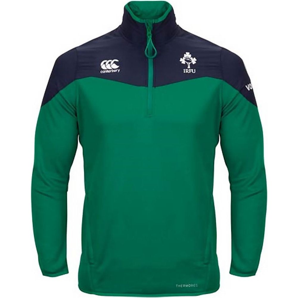 Canterbury Mens Ireland Wicking Thermal Layer Rugby Training Top. Forward facing side seam for ease of movement and fit. Binding around collar, cuff and hem for comfort and fit. Quick find zip pull for ease of adjustment mid workout. Thumb loops. Media loop/hanger at back neck. Embroidered logos. ThermoReg. Thermal regulation. Back hem drop. Media enabled.