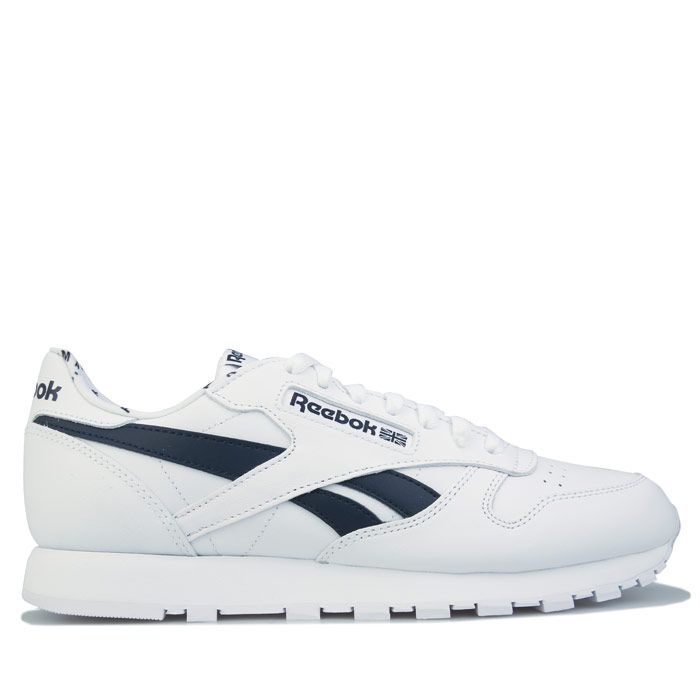 Mens Reebok Classics Classic Leather Trainers in White navy. – Soft leather upper. – Regular fit. – Die-cut EVA midsole for lightweight cushioning. – Contrast side stripes. – Iconic logo windows root them in sport. – Rubber outsole. – Leather and synthetic upper – Synthetic and textile lining – Synthetic sole. – Ref: FV9303