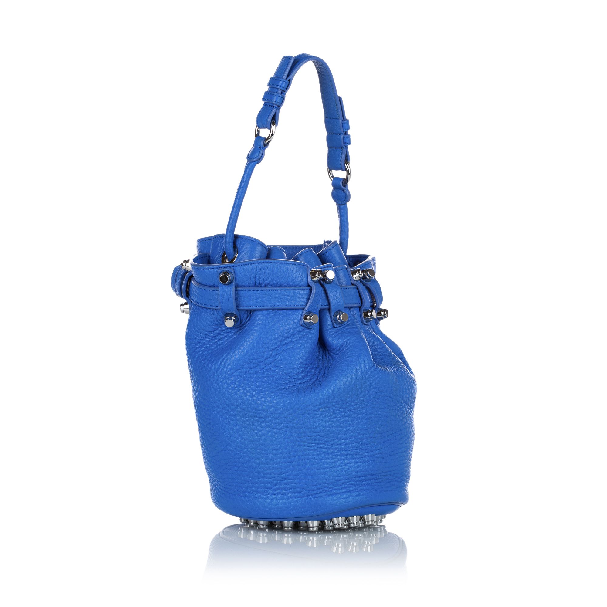 VINTAGE. RRP AS NEW. The Diego bucket bag features a textured leather body with aged brass tone hardware, exterior slip pockets, a top handle, an adjustable and detachable shoulder strap, an open top with a drawstring closure, and an interior zip pocket.Studs Scratched. Metal Attachment Scratched. 

Dimensions:
Length 25cm
Width 17cm
Depth 17cm
Hand Drop 18cm
Shoulder Drop 42cm

Original Accessories: Charm, Dust Bag

Serial Number: 13370
Color: Blue
Material: Leather x Calf
Country of Origin: China
Boutique Reference: SSU121138K1342


Product Rating: GoodCondition