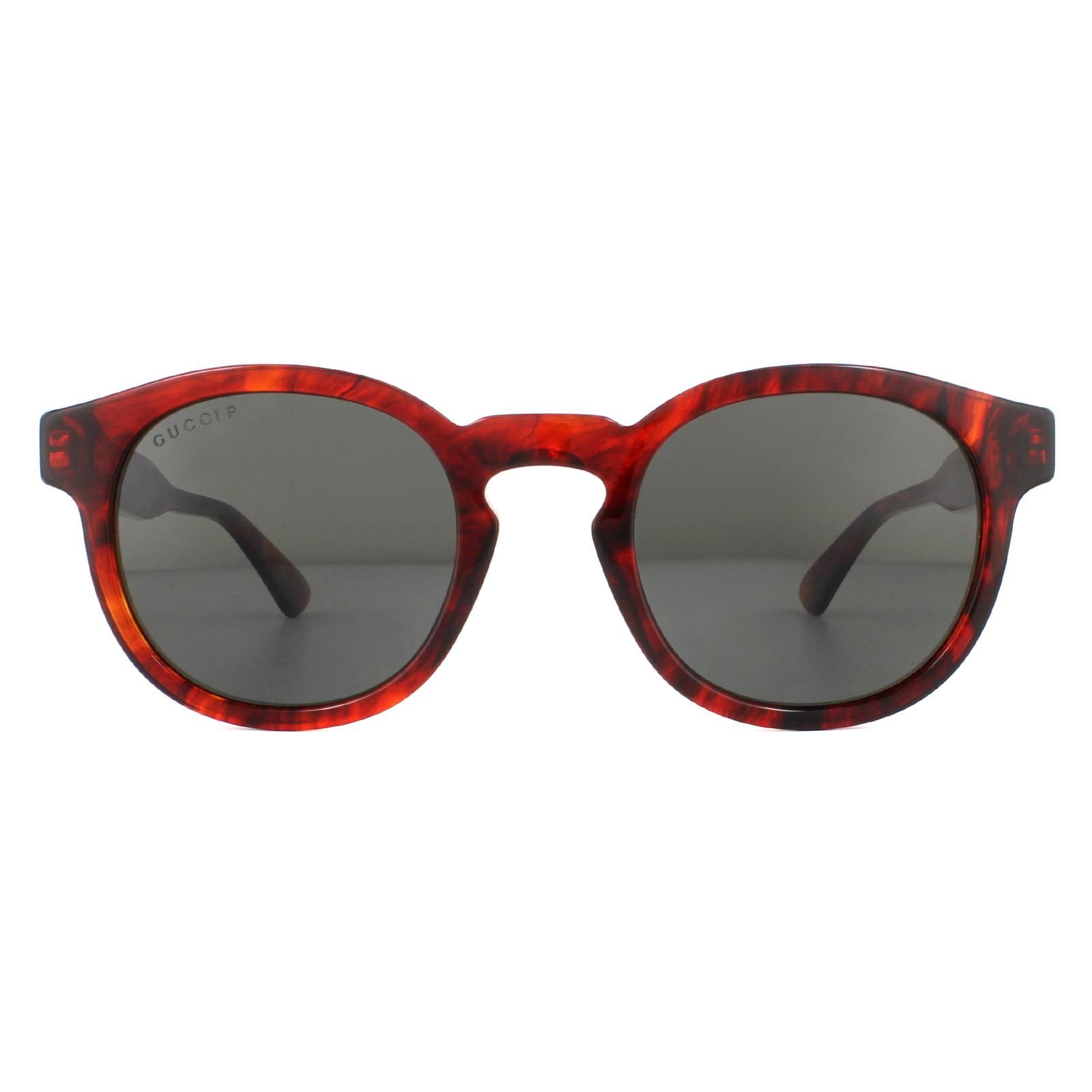 Gucci Sunglasses GG0825S 005 Havana Grey Polarized are a simple round style crafted from lightweight acetate. They feature a keyhole bridge and thin temple tips for a comfortable fit. To finish the look the Gucci brand features on the  temples for authenticity.