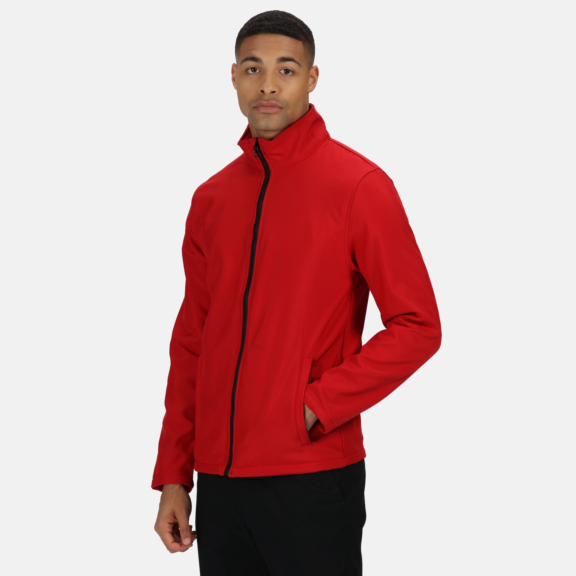 100% Polyester. Warm backed woven softshell jacket. Printable softshell fabric. Wind resistant membrane fabric. Durable water repellent finish. Inner zip guard, 2 lower pockets and adjustable shockcord hem.