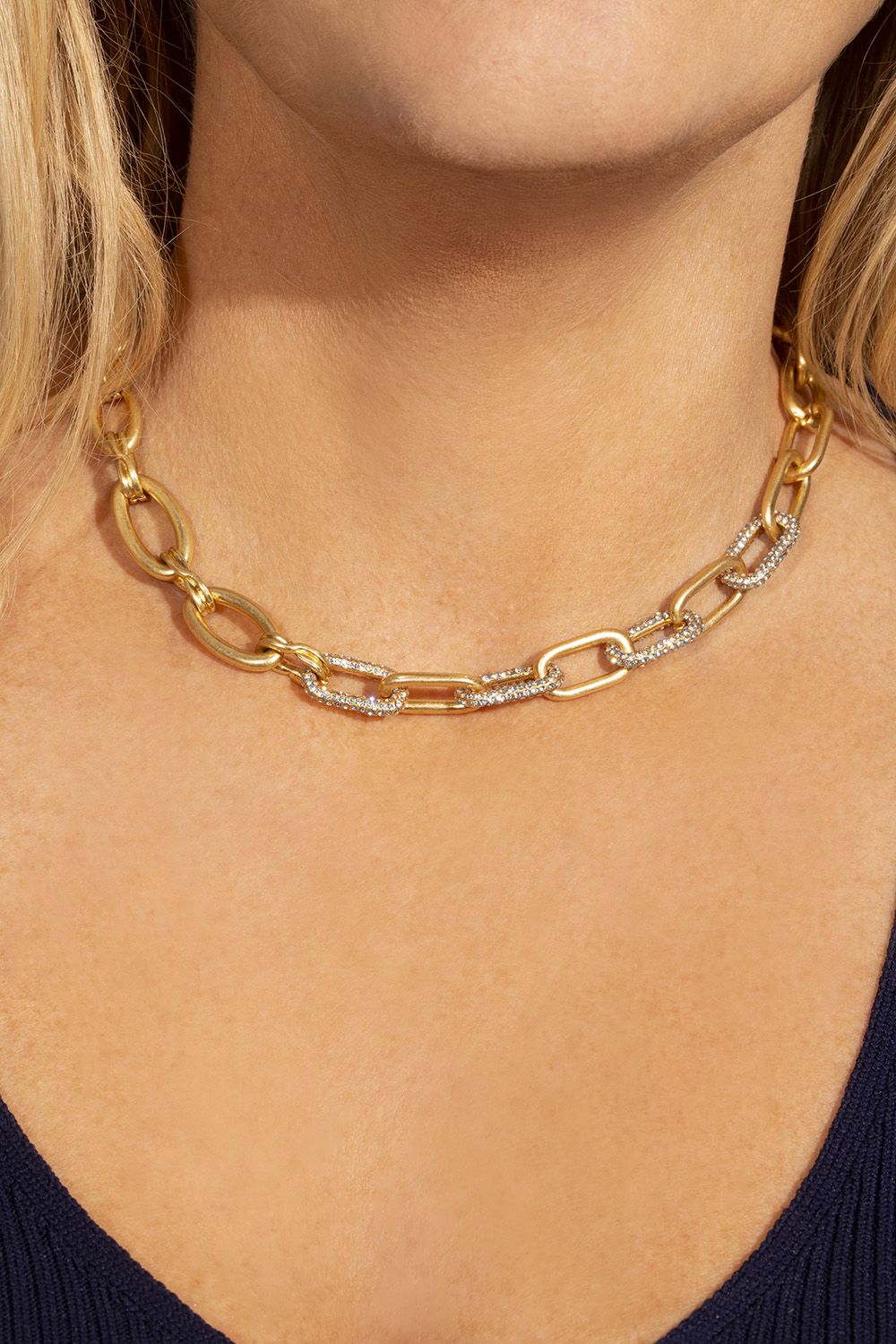 Simple and stunning, this gold chunky necklace features subtle sparkle with pave encrusted links on one half. Strong but delicate, it's such an on trend look right now and perfect for the winter months when we need our jewellery to really shine through. The 16 inch gold plated chain features a lobster clasp and 3 inch extender so you can adjust it for your look. It also comes with the most perfect matching bracelet! When it doubt, go simple and style it out.