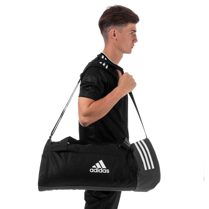 Mens adidas Convertible 3-Stripes Duffel Bag- Medium  Black-White.  <BR><BR>- Zip main compartment; Ventilated zip shoe pocket; Zip pocket on end; Three inside slip-in pockets.<BR>- Adjustable padded shoulder strap; Air mesh padded carry handles. <BR>-Convertible Pack2Go duffel-to-backpack construction.<BR>- TPE-coated base for durability. <BR>- Iconic 3-stripes across top end. <BR>- Screenprinted adidas Badge of Sport on side. <BR>- Dimensions: 58 cm x 27 cm x 27cm <BR>- 100% polyester plain weave. Machine washable.<BR>- Ref: CG1533.
