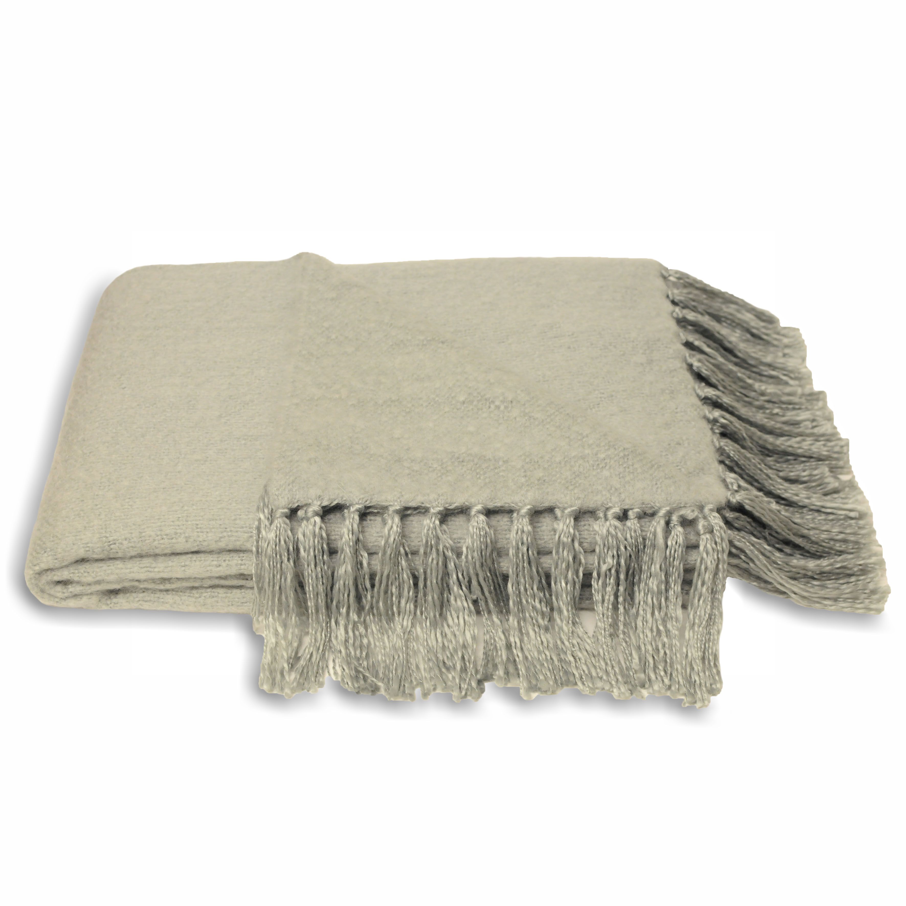 Update your decor and bring a pop of colour to your home with Chiltern woven throw. Featuring a contemporary colourway, this throw has been manufactured specifically out of the finest fabric to be as soft as possible. This contemporary fringed design will add a touch of good look to your living space and are ideal to snuggle up under on a cold night or to use during summer as a decorative accessory. This throw is made of 100% acrylic and therefore possesses all of it's advantages including being immune to fading and shrinkages. This gentle throw is hand wash only and is not appropriate to iron.