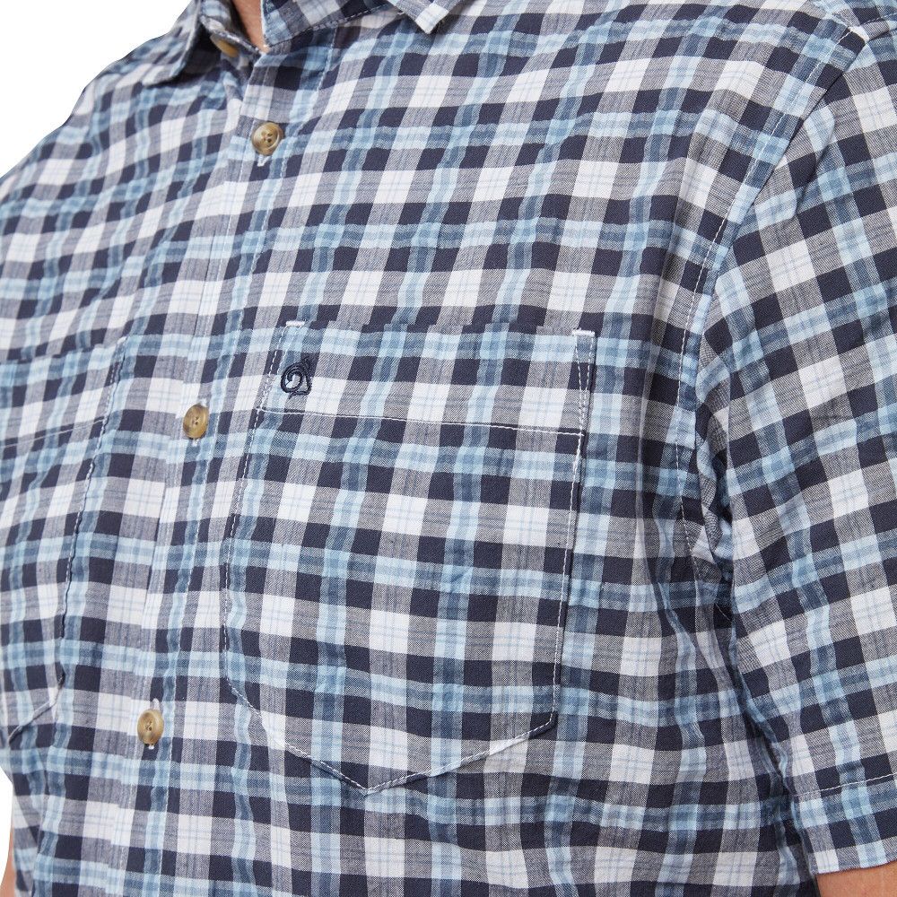 If you love the relaxed look and feel that only seersucker can capture, this classic check shirt should be at the top of your summer wish-list. Made from a cotton/polyester blend, Pele is naturally cool and comfortable against the skin and has a textured weave that requires no ironing. A great holiday pick.