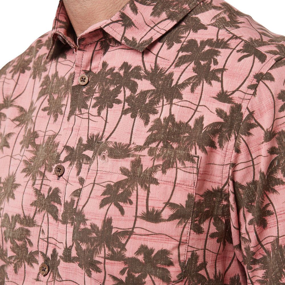 Give your travel bag an instant lift with this classic palm-print summer shirt. The shirt’s relaxed 100% natural bamboo-and-cotton blend fabric is naturally cool and comfortable and requires little in the way of maintenance – just wash and hang to dry using the built-in loops. Lightweight and comfortable for holiday adventures.