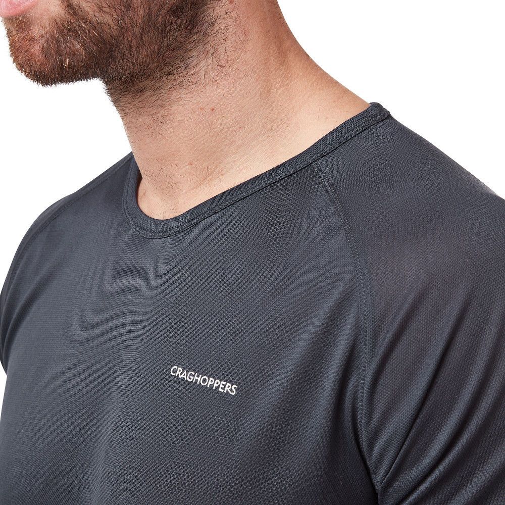 A versatile base layer that provides cooling protection from UV rays and biting insects. The NosiLife polyester mesh construction turns an agile technical tee into a hot-climate performer, with moisture-wicking and anti-odour action that helps keep skin fresh all day long. Featuring simple crew neck styling and reflective detail.
