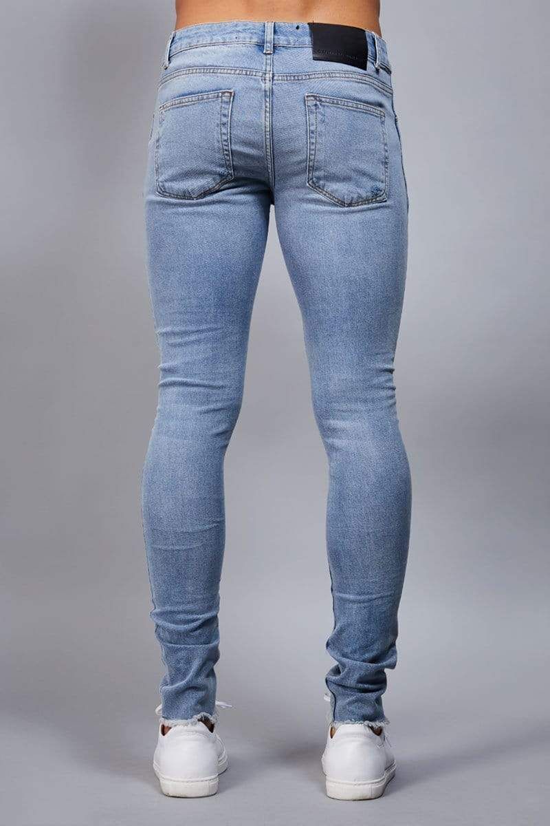 Curtis skinny jeans by Criminal Damage, A male-specific variant of our stretch jeans with knee rips, Branded silver button and rivets, Zipper fly, Comfort