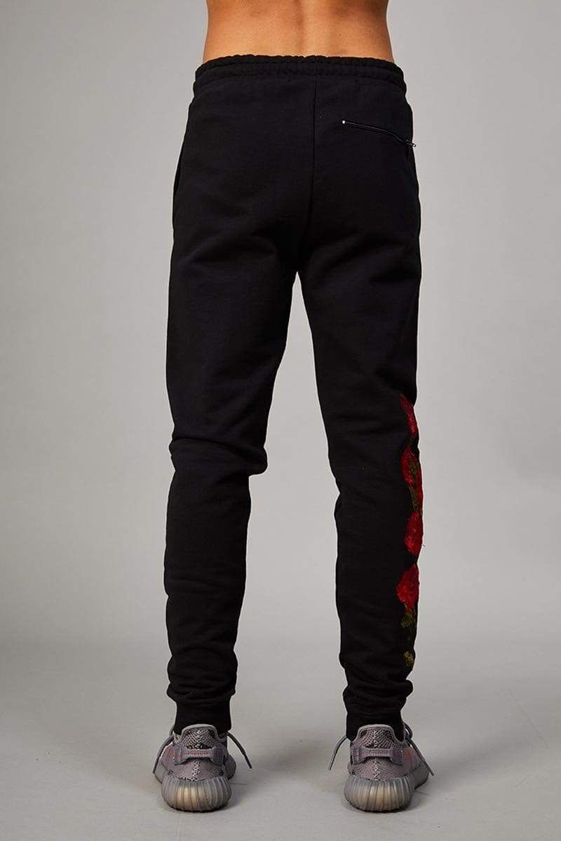 Thorn jogger with embroidered roses, CD Logo details