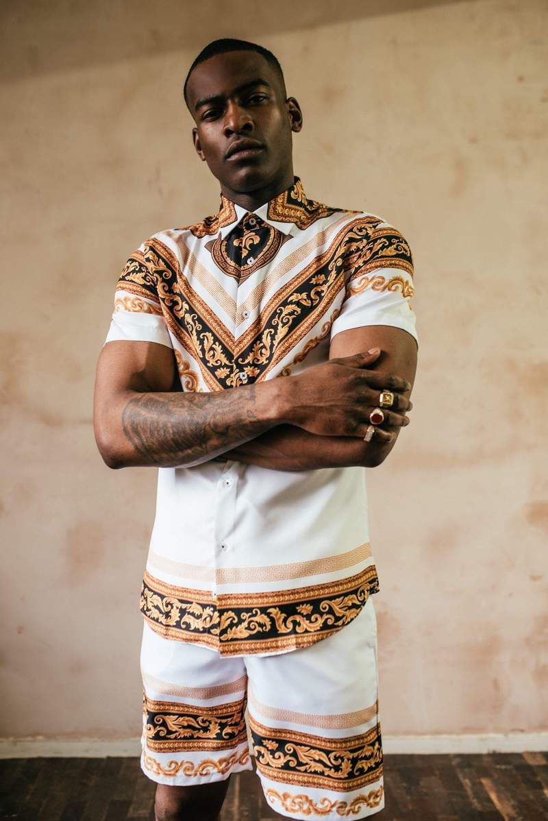 Apollo short sleeve shirt with gold and black baroque print all-over.