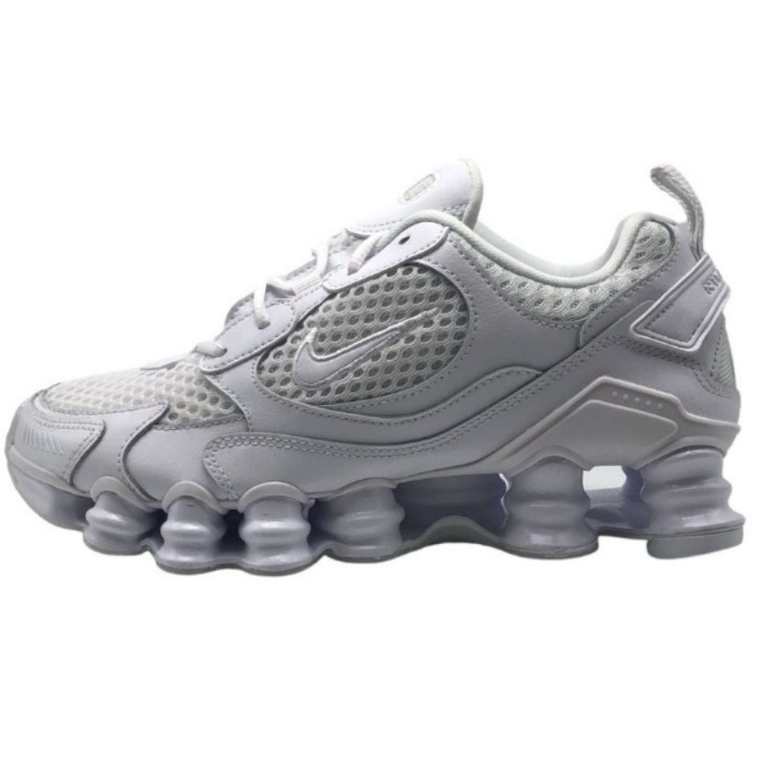Nike Shox TL Nova Womens Triple White Sneakers. Textile and Other Materials Upper, Rubber Sole. Style: CV3602 103. Nike Shox Cushioning. Lace Fasten Trainers. Branding On The Tongue
