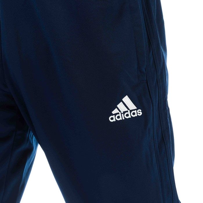 Mens adidas Condivo 18 Tracksuit Bottoms in dark blue - white.<BR><BR>- Elasticated waist with inner drawcord.<BR>- Side welt pockets.<BR>- Applied 3-Stripes to sides.<BR>- Ankle zips for easy on - off.<BR>- Embroidered adidas Badge Of Sport logo at left thigh.<BR>- Tapered leg.<BR>- Slim fit.<BR>- Main material: 100% Polyester.  Machine washable.<BR>- Ref: CV8258