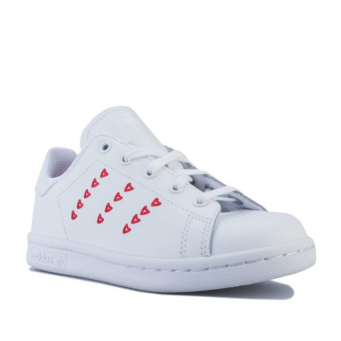 Children Girls adidas Originals Stan Smith Trainers in footwear white - lush red.<BR><BR>- Smooth coated leather upper.<BR>- Lace closure.<BR>- Padded collar.<BR>- 3-Stripes to sides in an embroidered heart design.<BR>- Synthetic leather heel patch with printed Stan Smith logo.<BR>- Tonal Stan Smith branding printed on tongue.<BR>- Comfortable textile lining.<BR>- Removable Ortholite sockliner for comfort and odour control.<BR>- Rubber cupsole.<BR>- Leather and synthetic upper  Textile lining  Synthetic sole.<BR>- Ref: EG6500