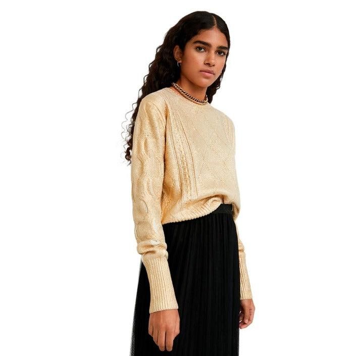 Brand: Desigual
Gender: Women
Type: Knitwear
Season: Fall/Winter

PRODUCT DETAIL
• Color: gold
• Pattern: plain
• Sleeves: long
• Neckline: round neck

COMPOSITION AND MATERIAL
• Composition: -59% cotton -41% various 
•  Washing: machine wash at 30°