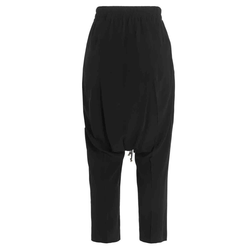 'Drawstring Cropped' crêpe pants featuring a low crotch and an elastic waistband.